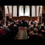 Hoestbui achter de trombone