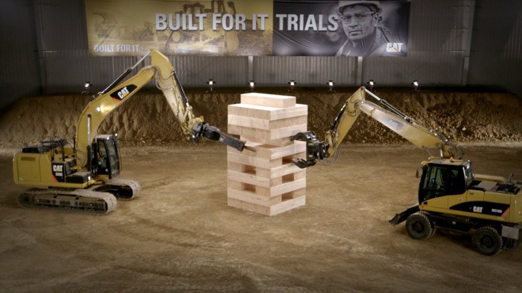 Jenga met graafmachines