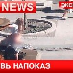 Koppel geeft van jetje in fontein